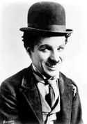 Chaplin in his famous "Tramp" costume